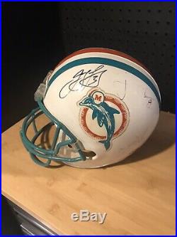 Miami Dolphins FULL Size Helmet Signed By 5 Past Players And 2 Jerseys