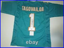 Tua Tagovailoa #1 Miami Dolphins Autographed Signed Football Jersey Beckett COA