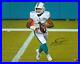 Tua-Tagovailoa-Miami-Dolphins-Signed-16-x-20-White-Jersey-Rolling-Out-Photo-01-aa