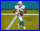 Tua-Tagovailoa-Miami-Dolphins-Signed-8-x-10-White-Jersey-Rolling-Out-Photo-01-azkt