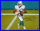 Tua-Tagovailoa-Miami-Dolphins-Signed-8-x-10-White-Jersey-Rolling-Out-Photo-01-gsl