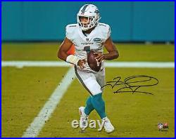 Tua Tagovailoa Miami Dolphins Signed 8 x 10 White Jersey Rolling Out Photo