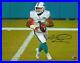 Tua-Tagovailoa-Miami-Dolphins-Signed-8-x-10-White-Jersey-Rolling-Out-Photo-01-wxw